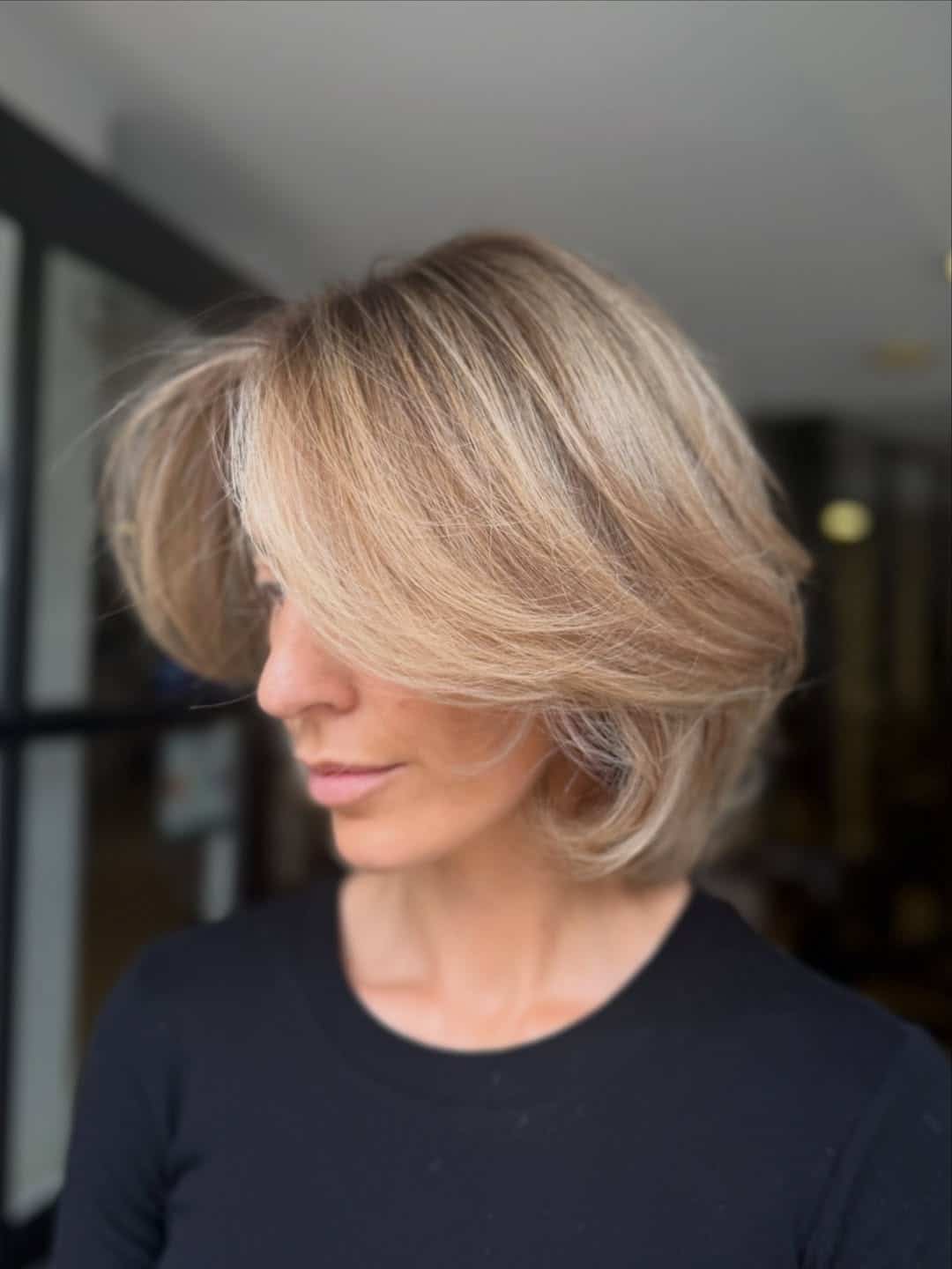 37. Soft Layered Sandy Bob with Sweeping Fringe