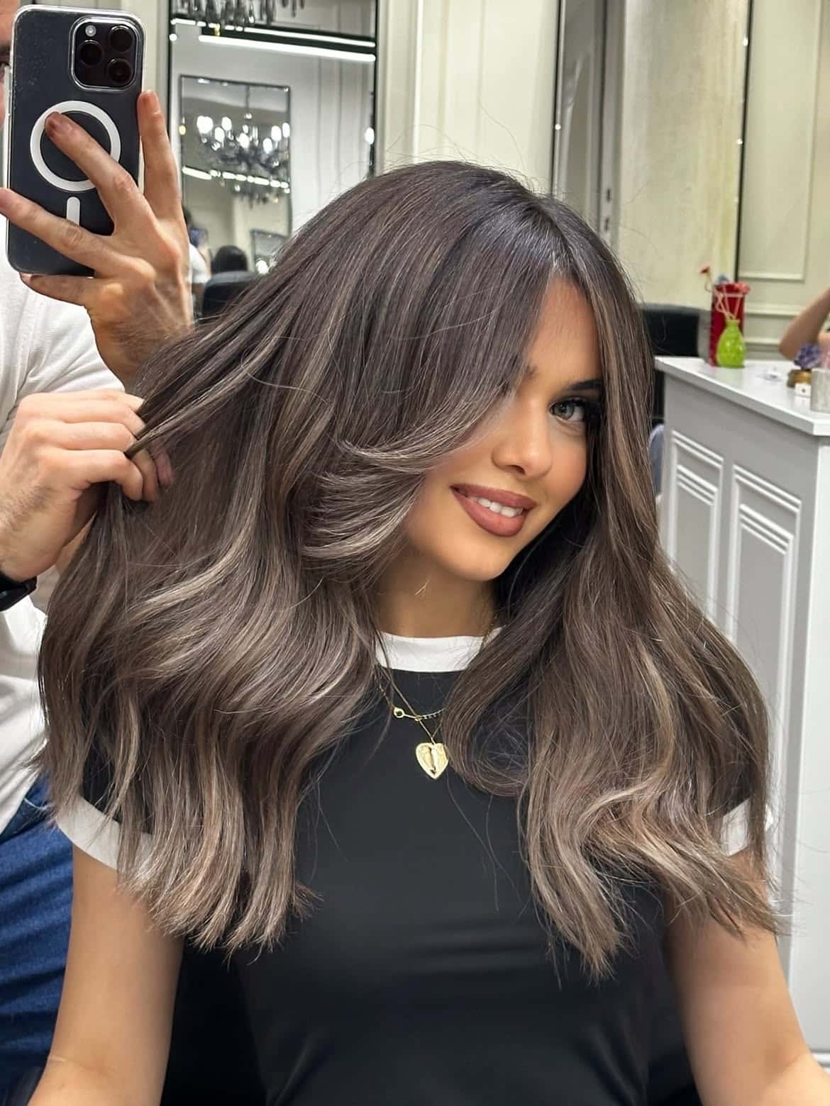 6. Soft Layered Waves with Curtain Bangs