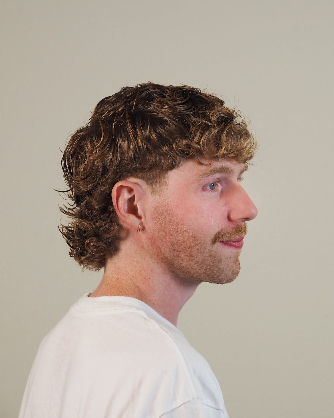 10. Soft Taper Curly Mullet with Fringe