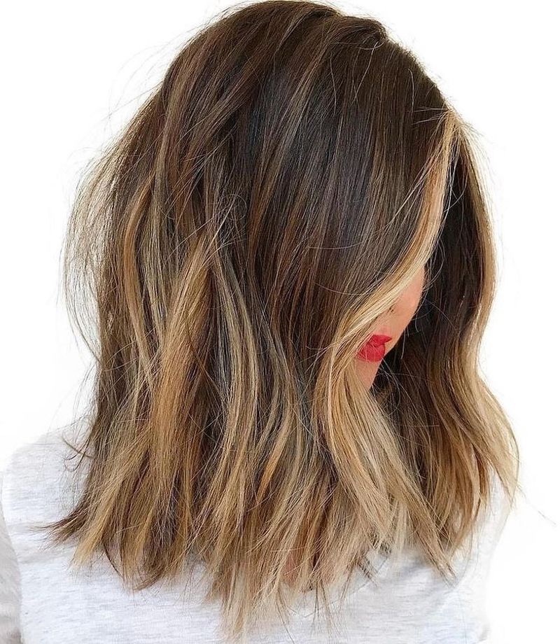 56. Sun-Kissed Tousled Lob
