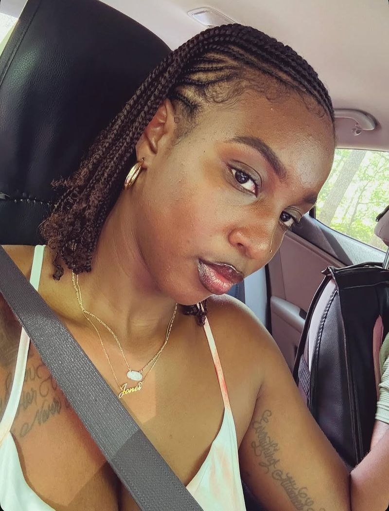 18. Swept-Back Micro Braids with Sleek Cornrows
