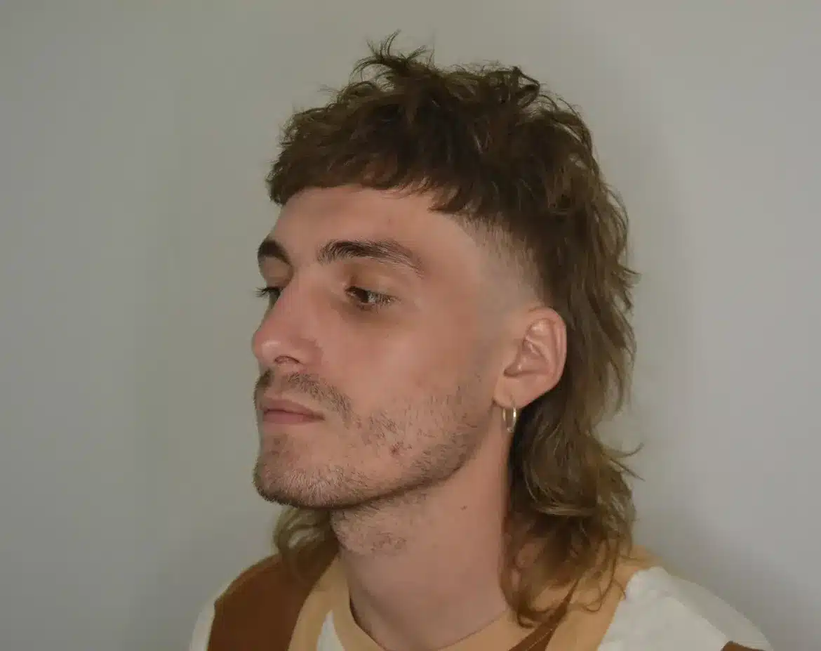 16. Tapered Fade with Curly Crown Mullet