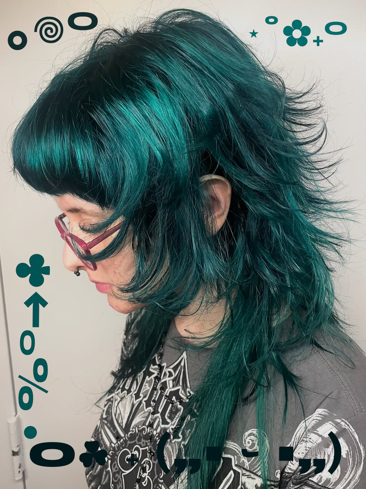 26. Teal Razor Shag Mullet with Blunt Bangs