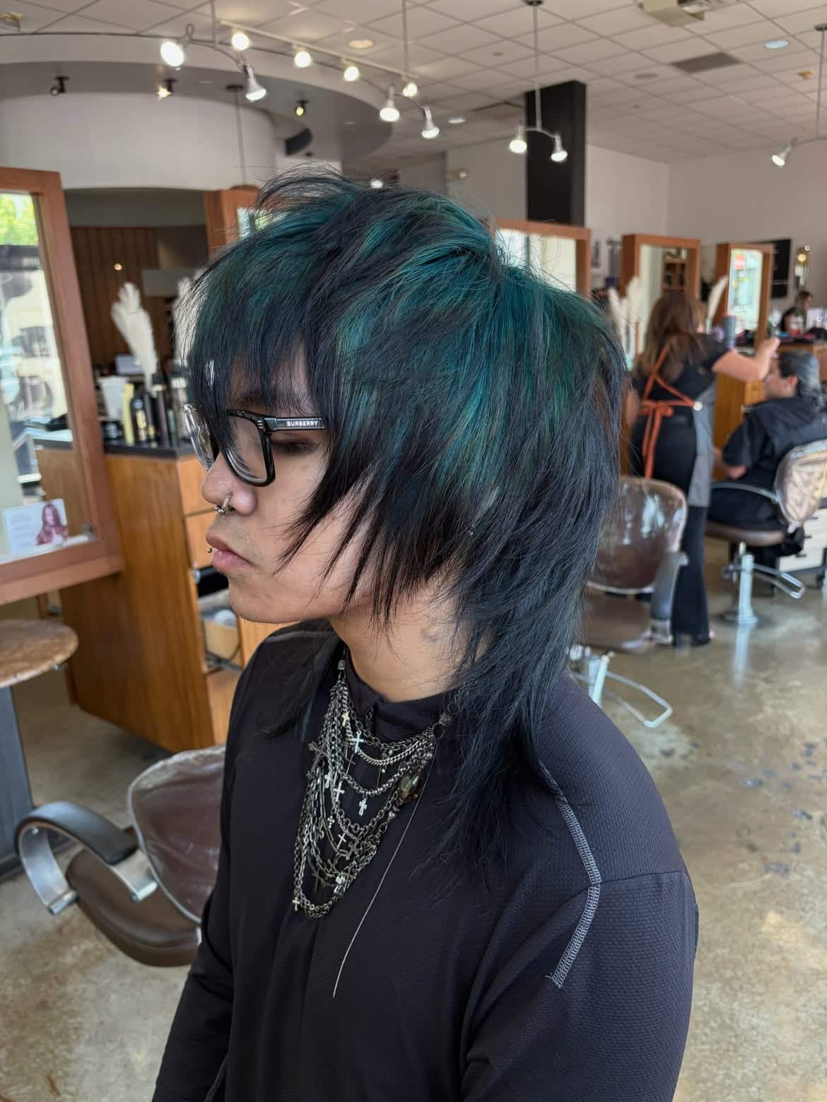 8. Teal-Streaked Emo Shag Mullet