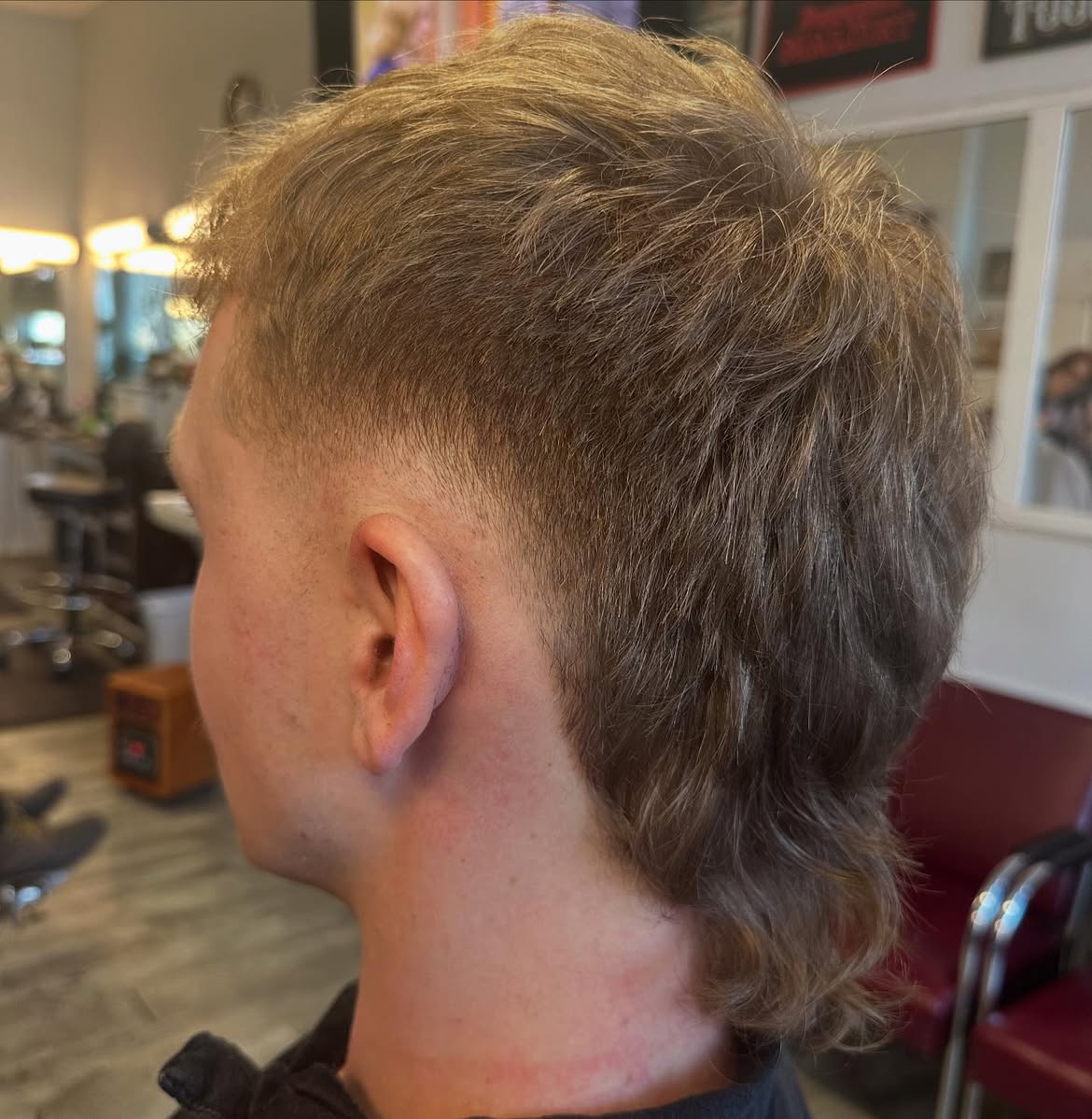 3. Textured Blonde Taper Mullet