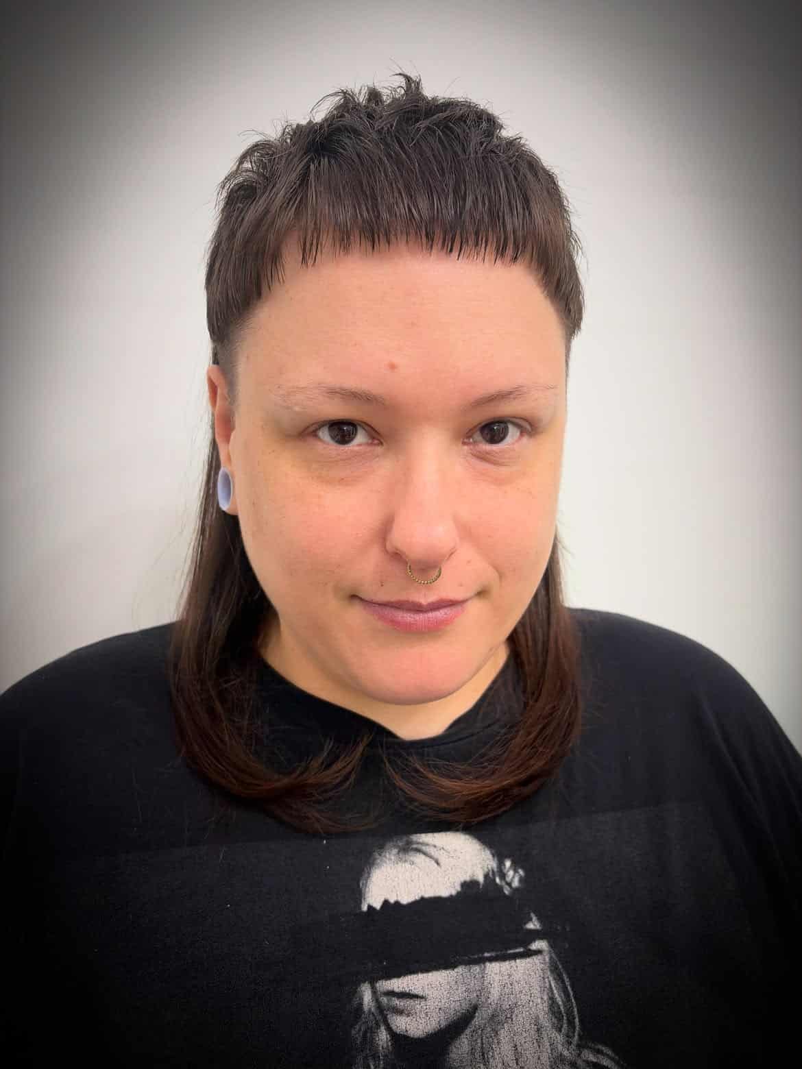6. Textured Bowl Mullet with Baby Bangs