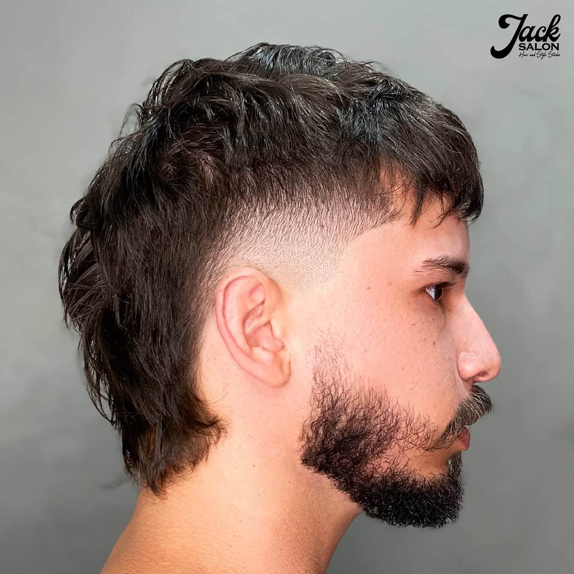 8. Textured Curly Mullet with Skin Fade
