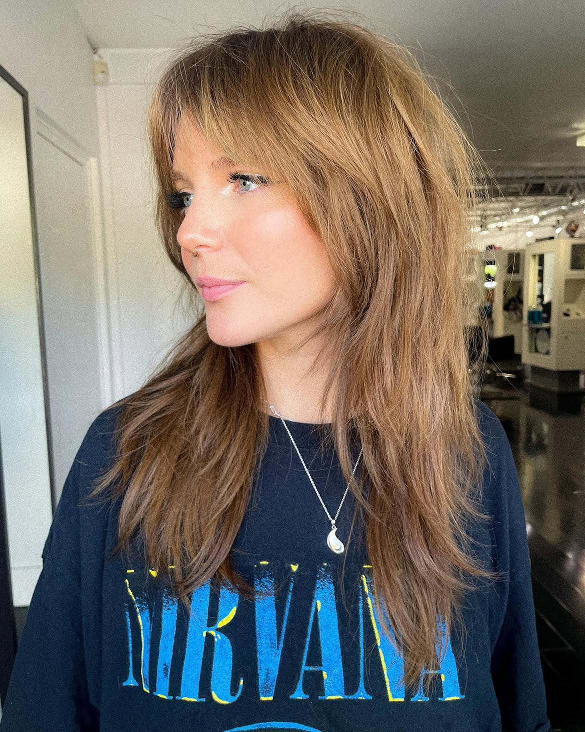 7. Textured Shag with Bottleneck Bangs