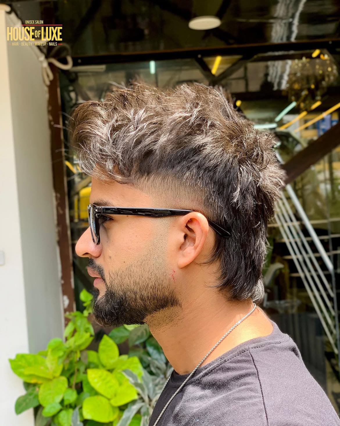 17. Textured Wavy Mullet with Low Burst Fade