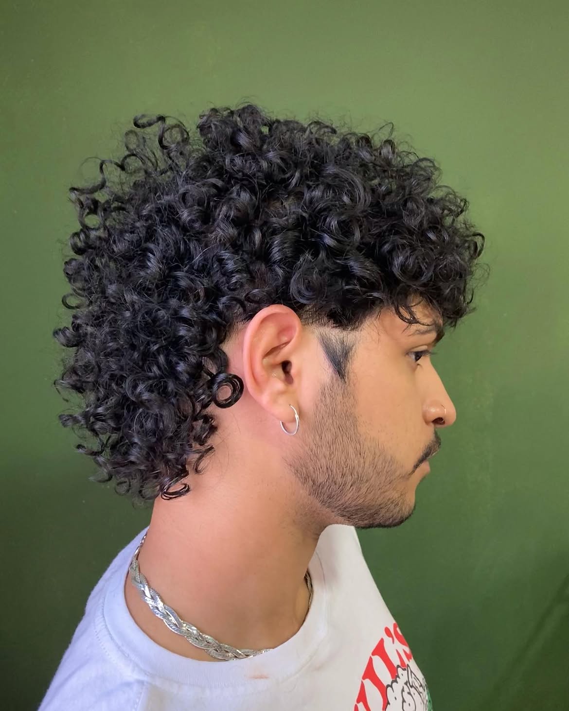 38. Tight Curl Mullet with Low Taper