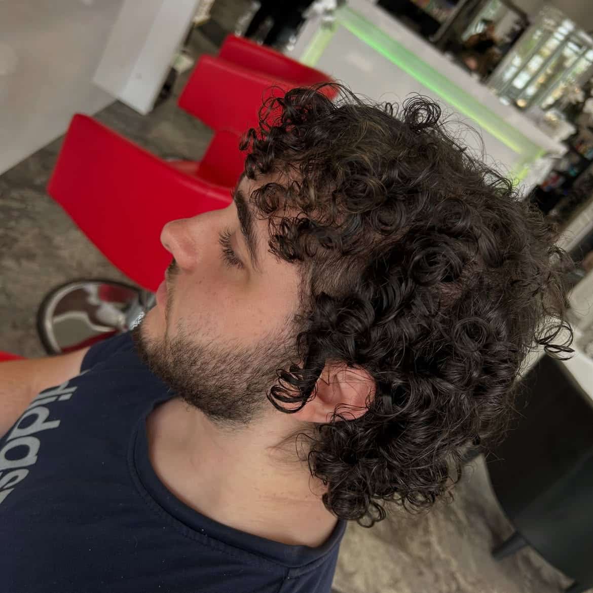 24. Tight Curl Mullet with Tapered Sides