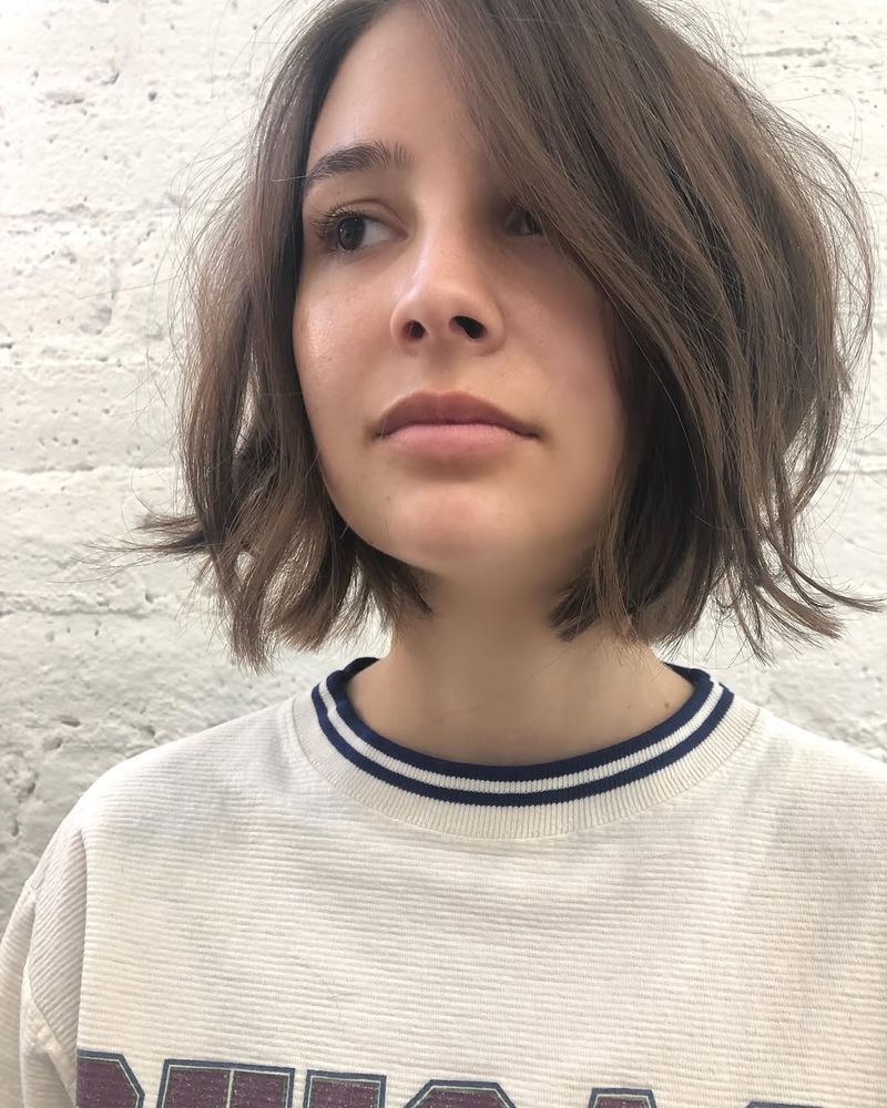 14. Tousled Ash Brown Bob with Flicked Ends