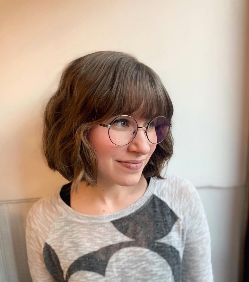 48. Tousled Brown Bob with Soft Fringe