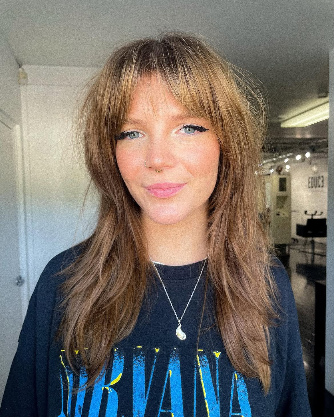 16. Tousled Chestnut Shag with Soft Fringe