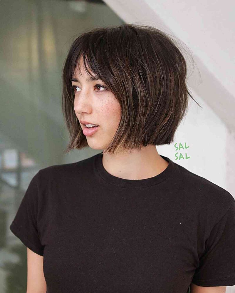 32. Tousled Dark Brown Bob with Piecey Bangs
