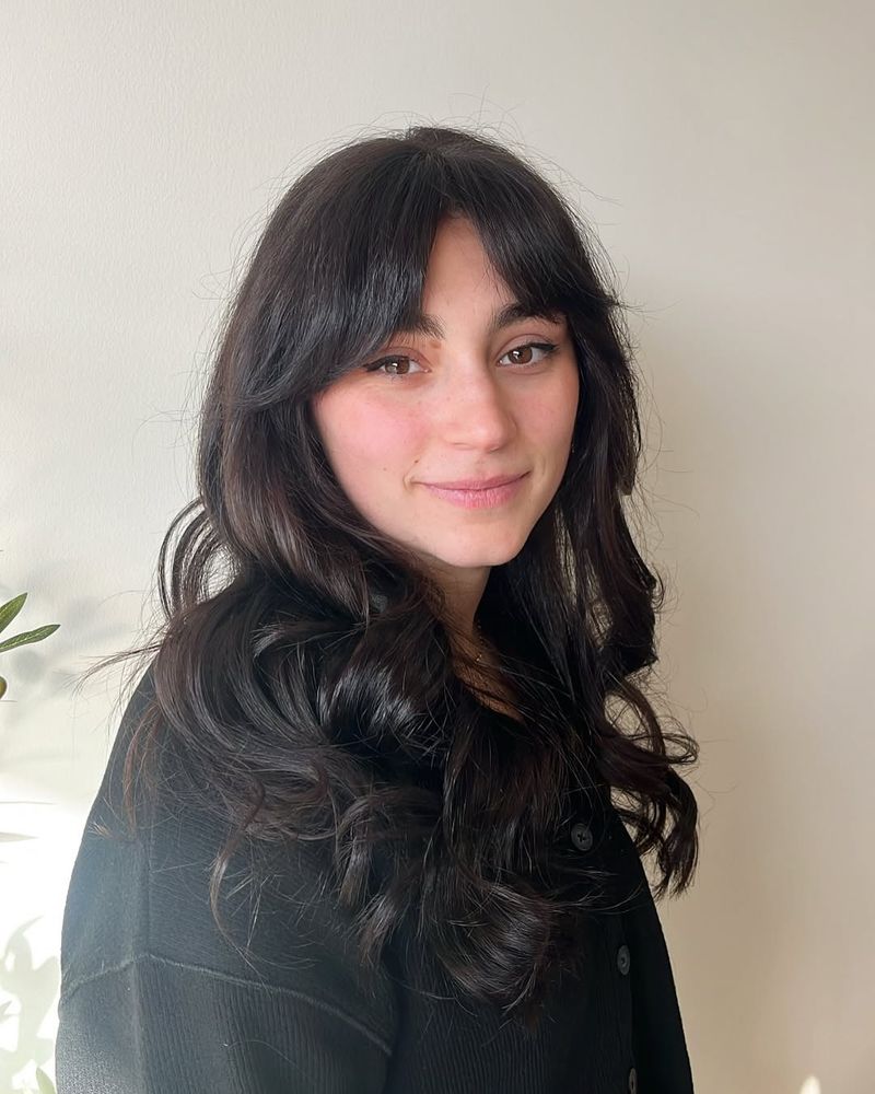 12. Tousled Dark Curls with Piecey Fringe