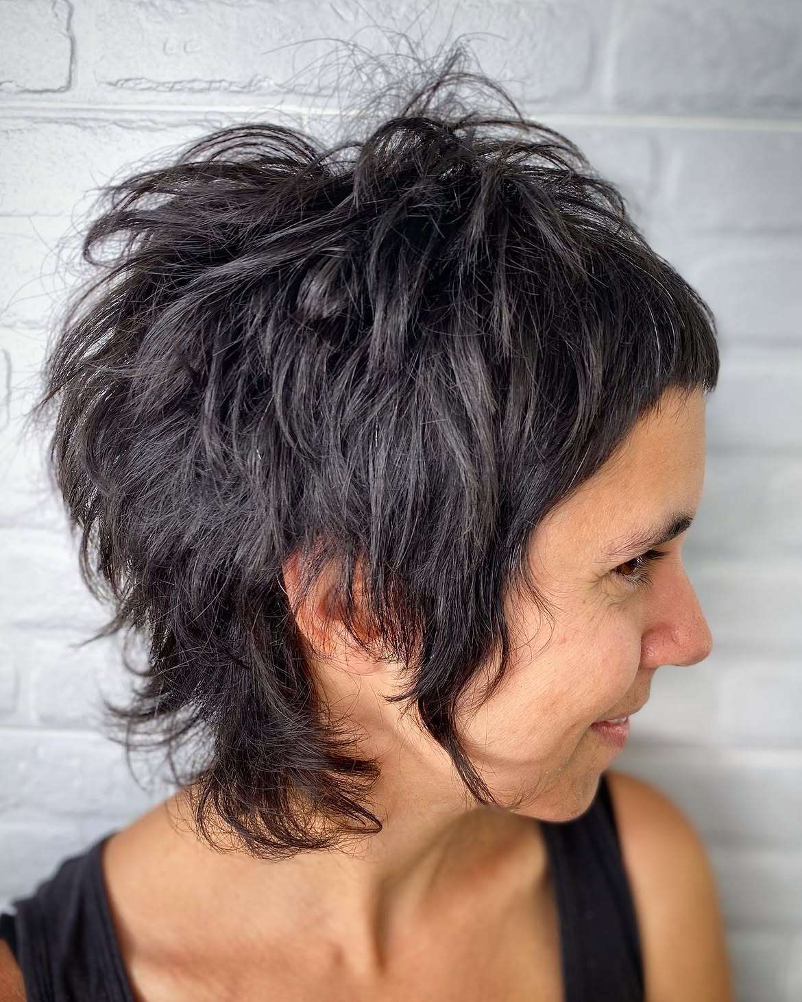 31. Tousled Raven Shag Mullet