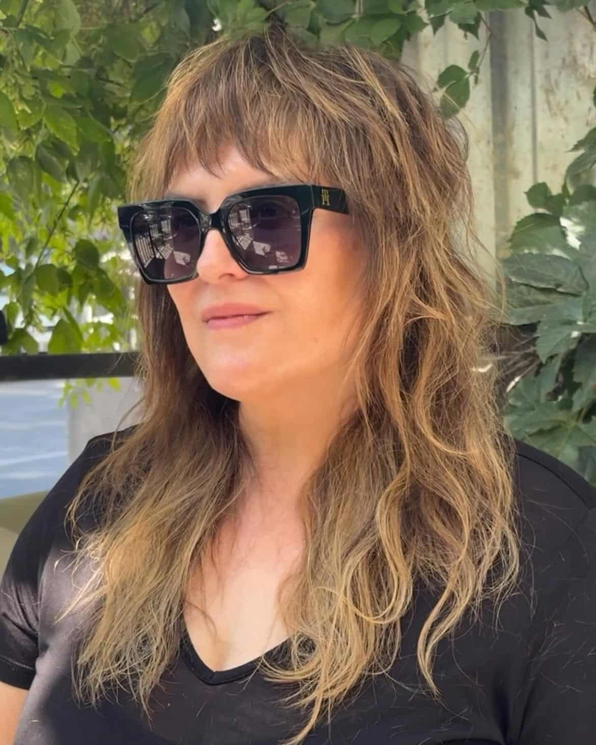 27. Tousled Shag with Bottleneck Bangs