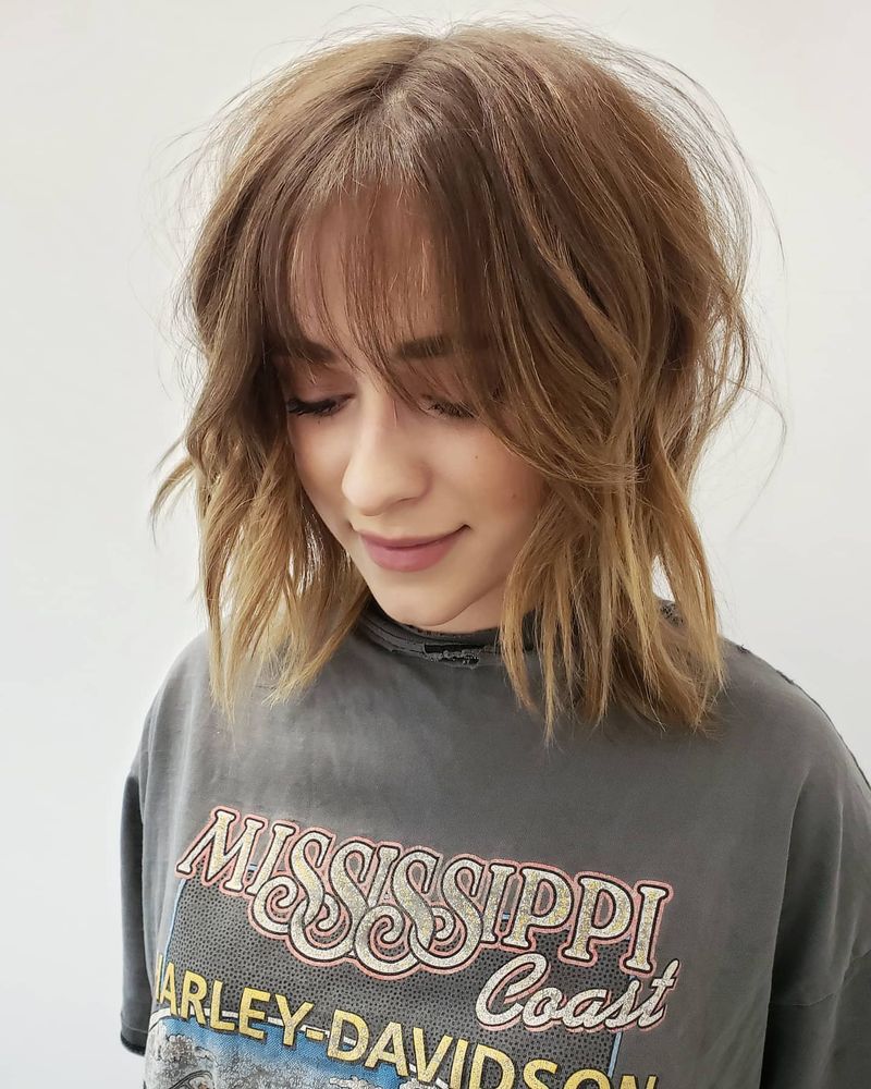 21. Tousled Shag with Wispy Fringe