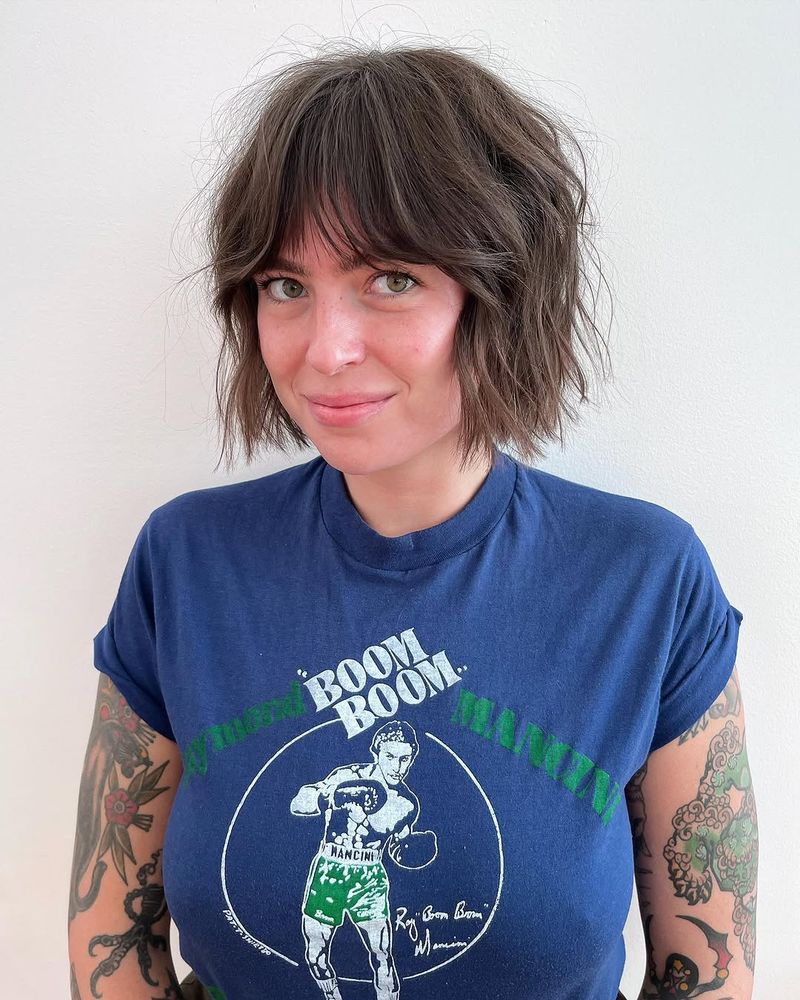 28. Tousled Shaggy Bob with Soft Bangs