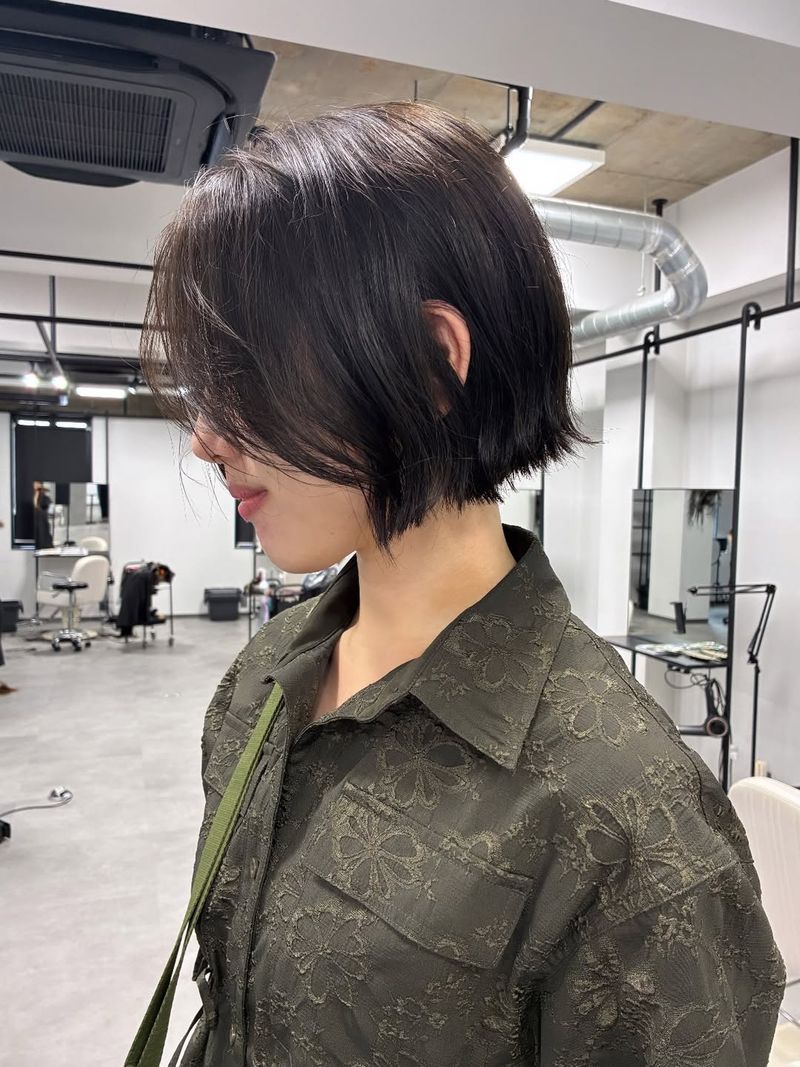 40. Tucked-Behind-Ear Chin Bob
