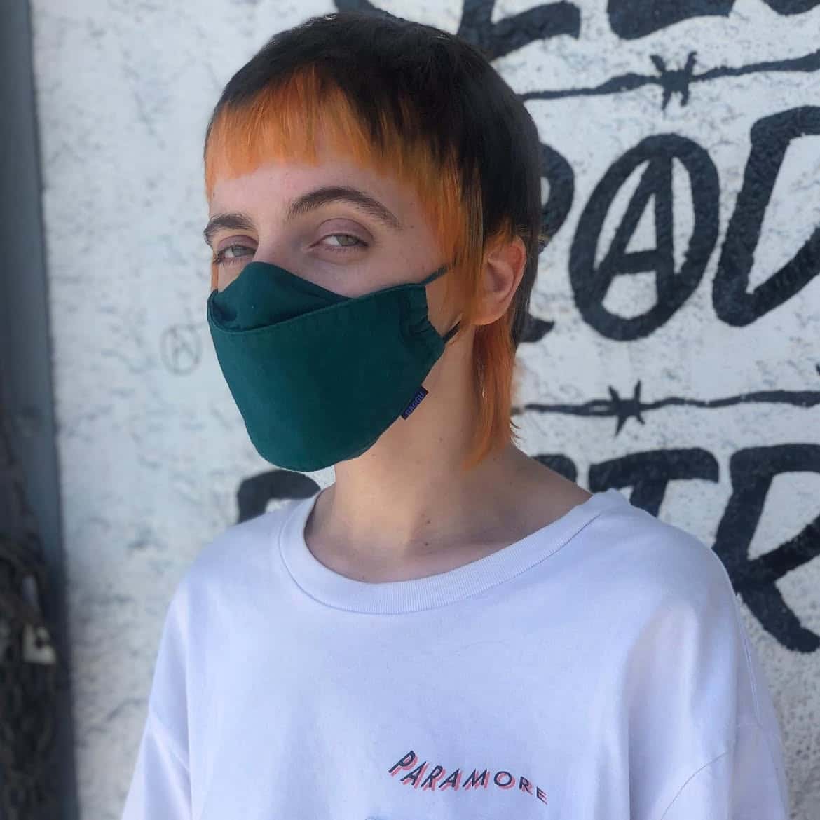 9. Two-Tone Orange and Black Mullet