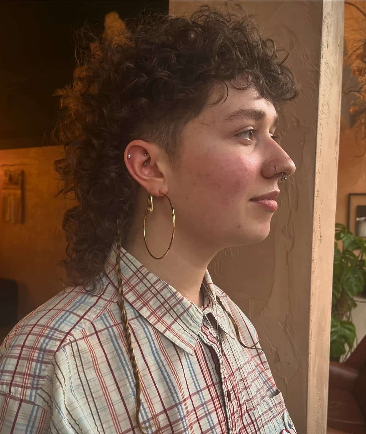 23. Undercut Curls with Braided Tail