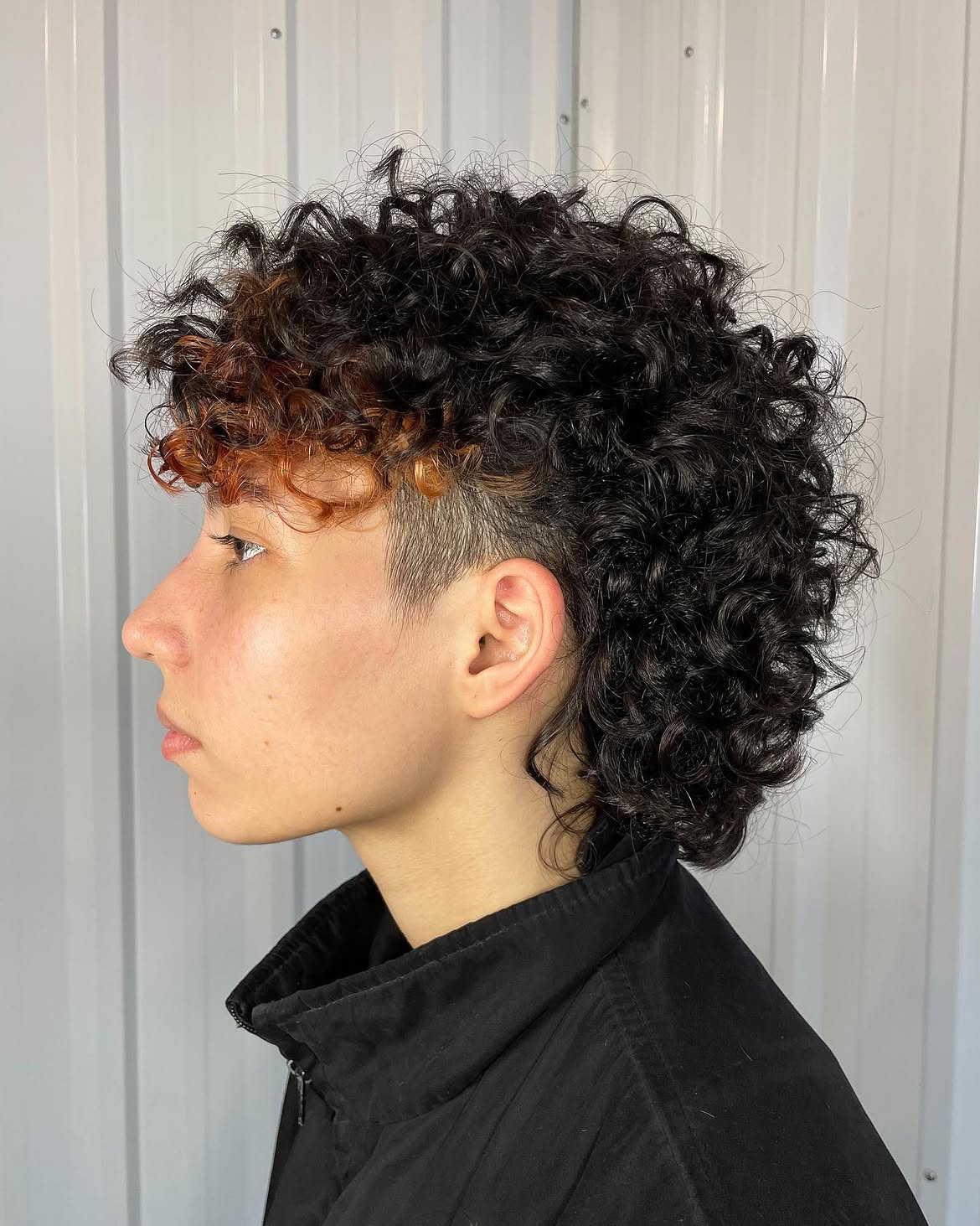 9. Undercut Curly Mullet with Copper Bangs