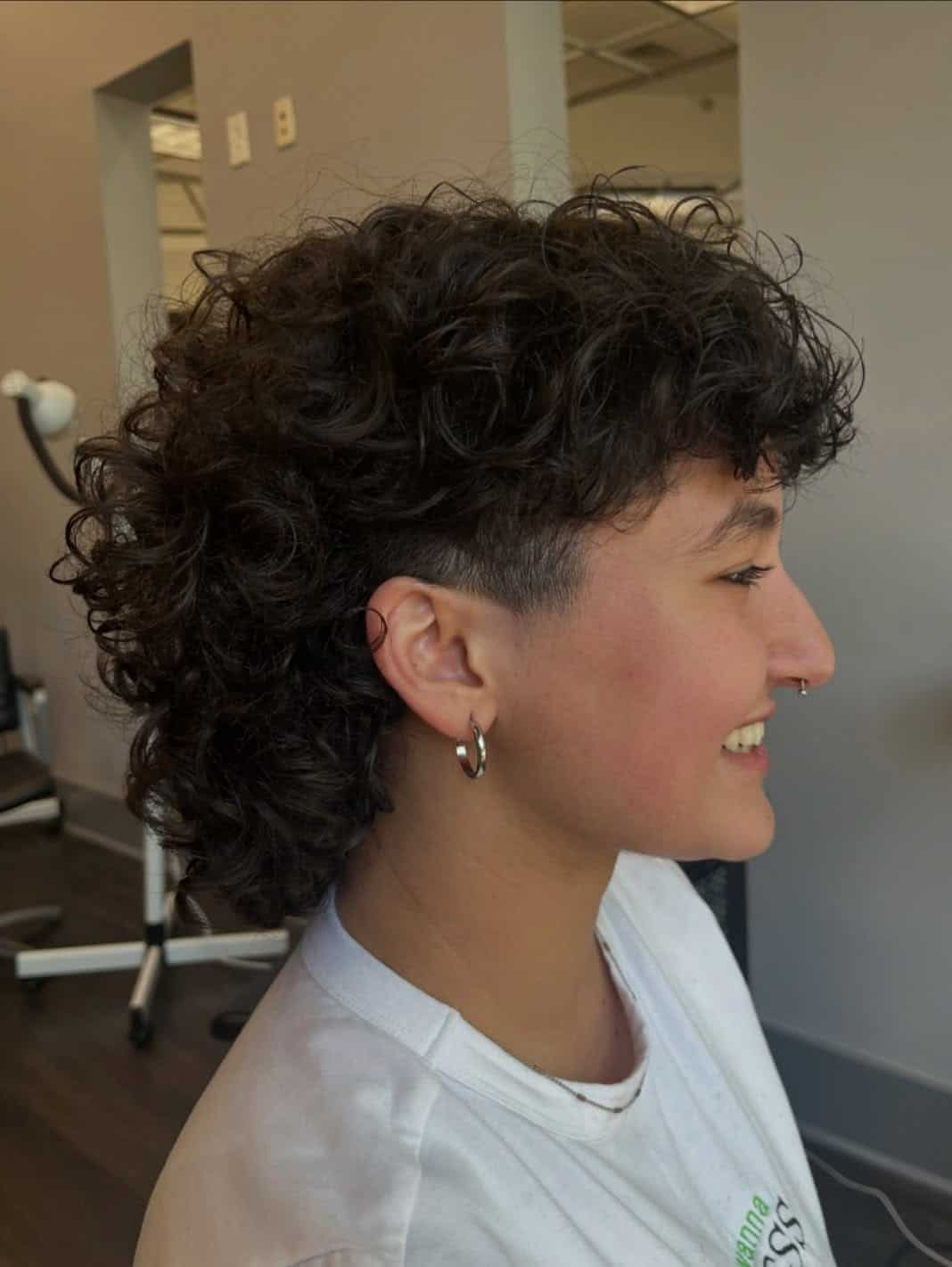 29. Undercut Curly Mullet with Short Fringe