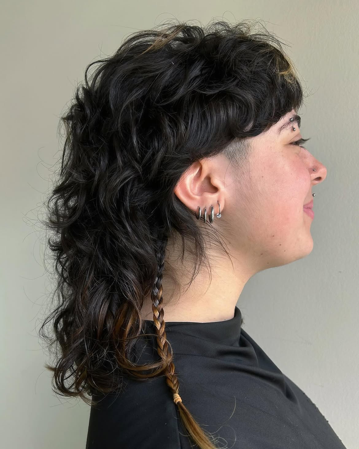 12. Undercut Mullet with Braided Tail and Fringe