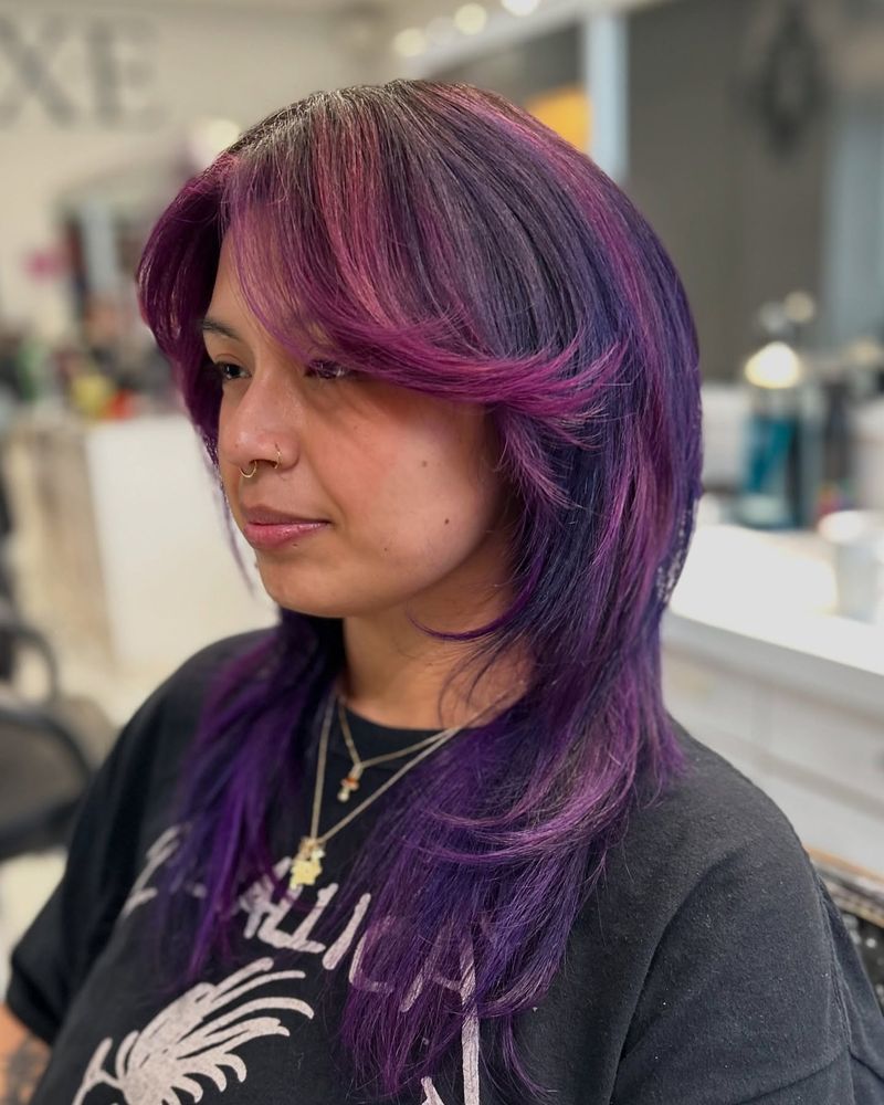 57. Vivid Violet Layers with Curtain Bangs