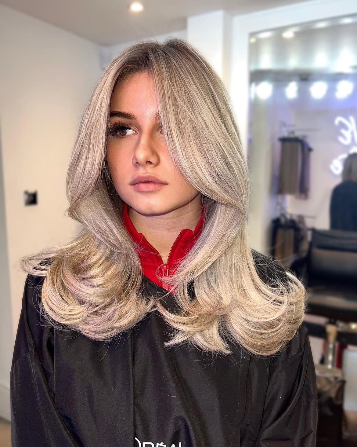 48. Voluminous Blowout with Face-Framing Layers