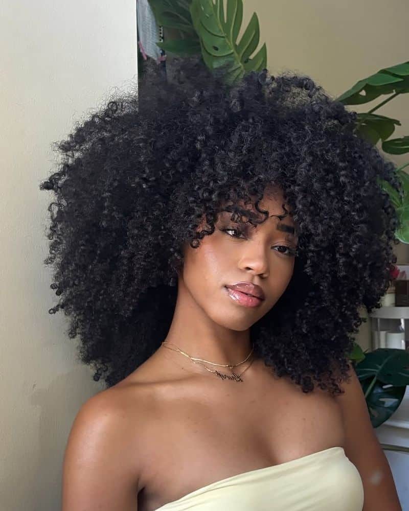 16. Voluminous Curls with Fringe