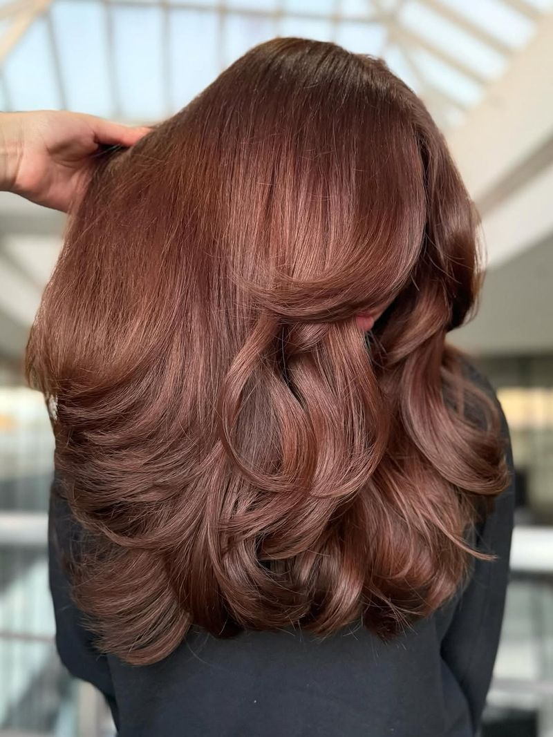 42. Voluminous Layered Mocha Curls