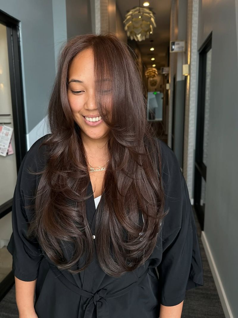 51. Voluminous Layers with Deep Chestnut Curls