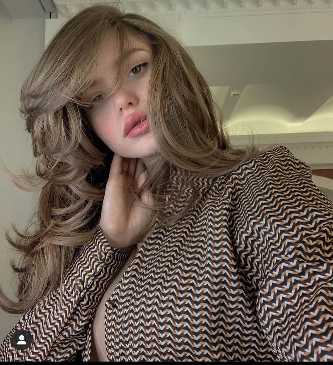 25. Voluminous Retro Layers with Deep Side Part