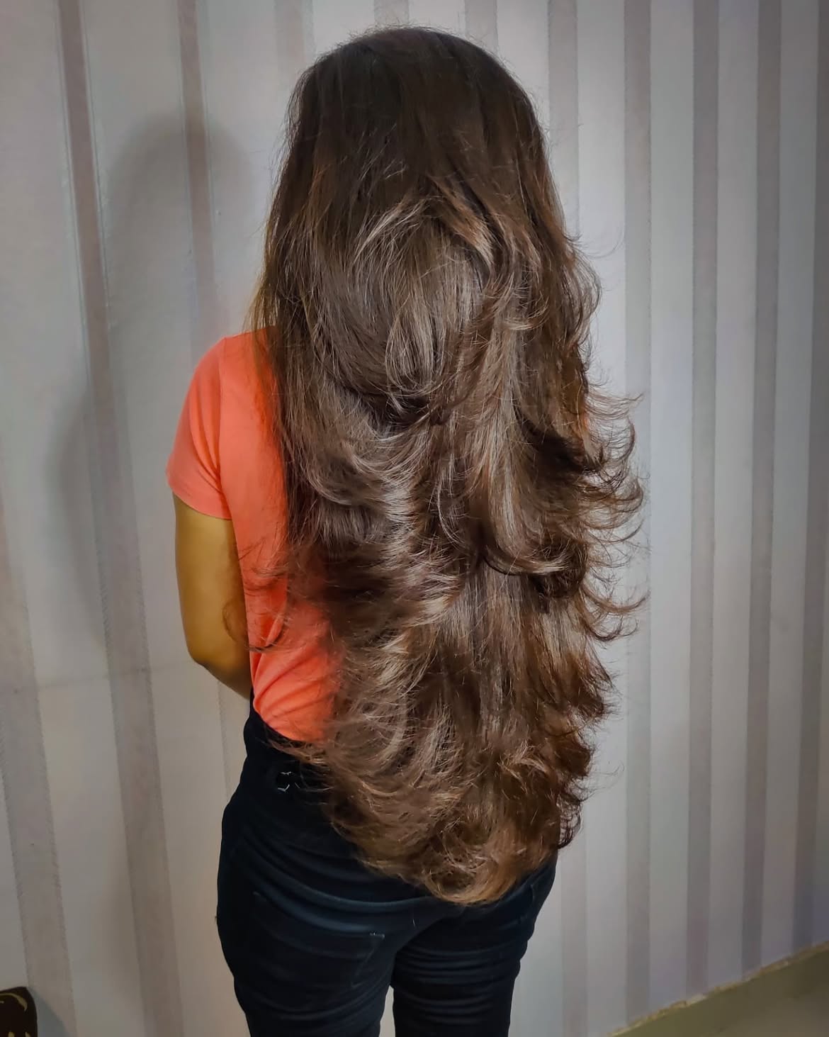 29. Waist-Length Feathered Layers