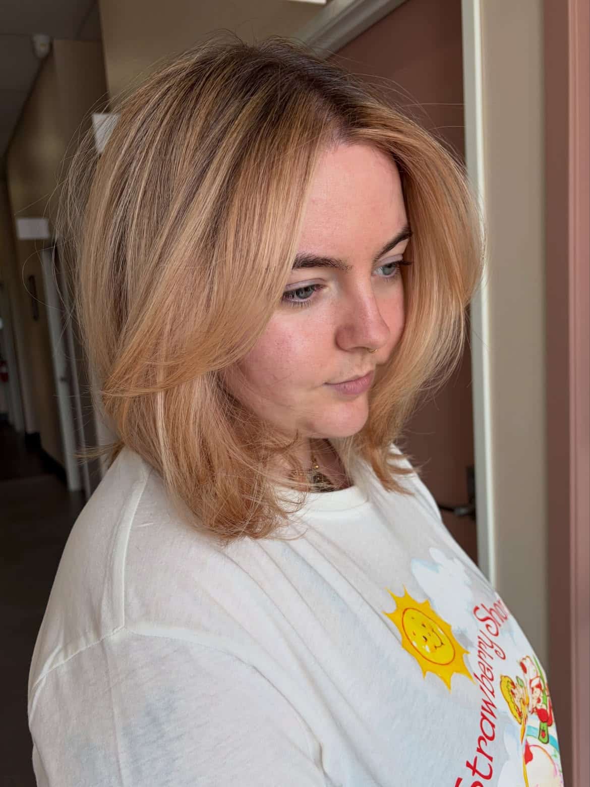 16. Warm Honey Lob with Curtain Bangs