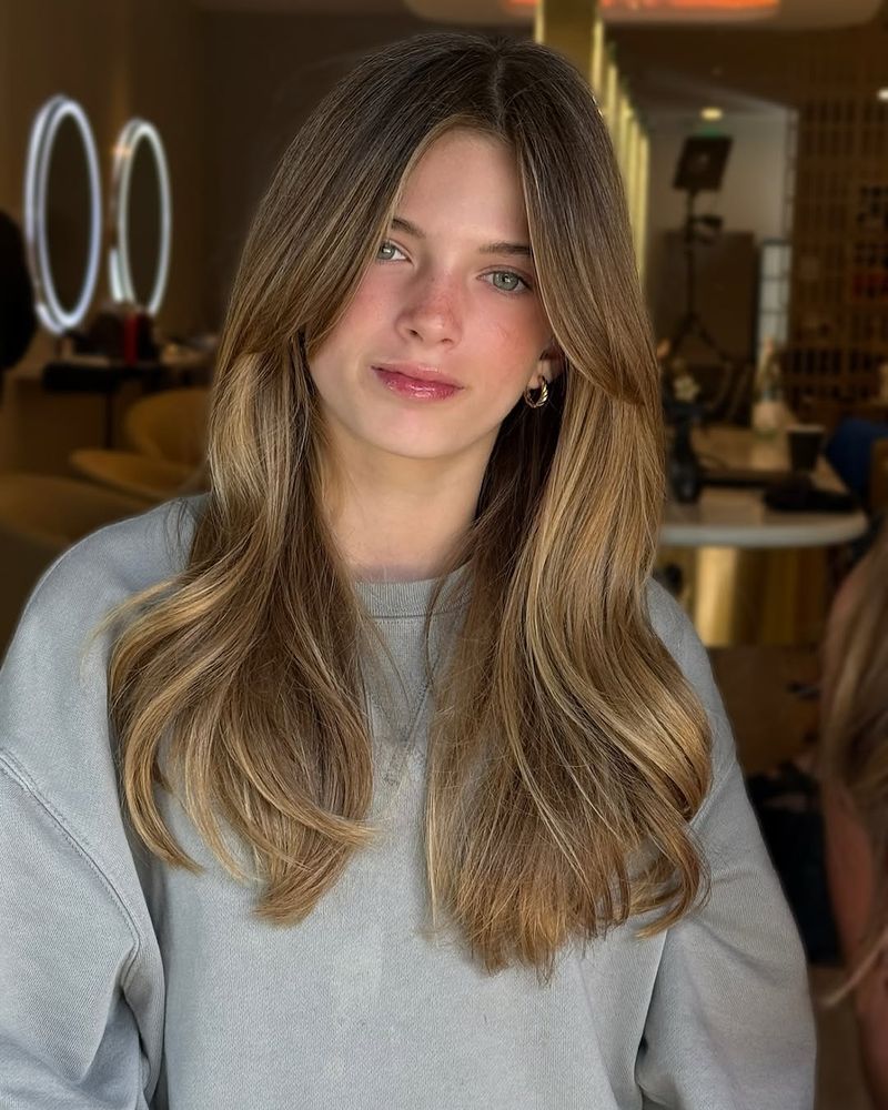 52. Warm Honey Waves with Long Face-Framing Fringe
