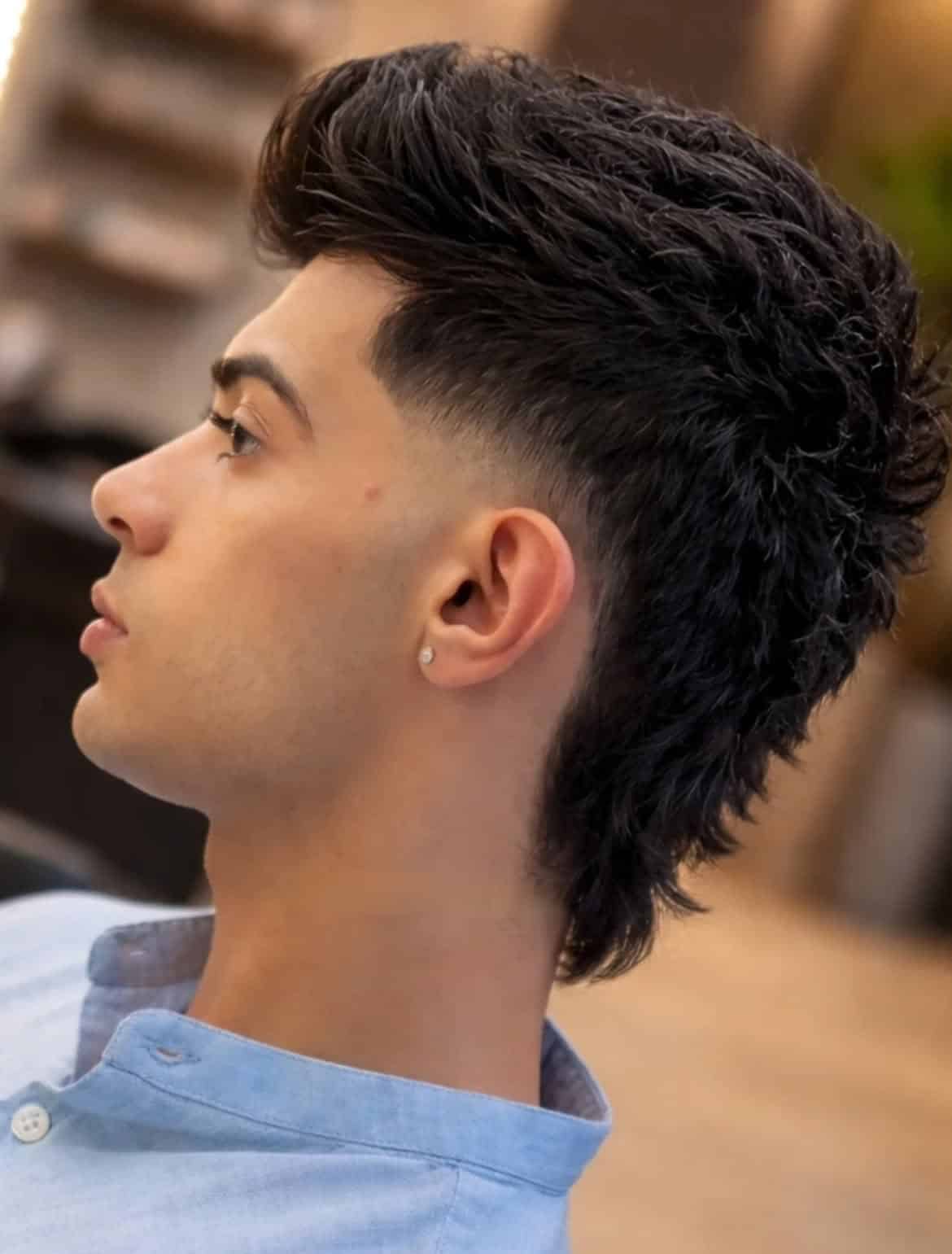 27. Wavy Mullet Fade with Tapered Sides