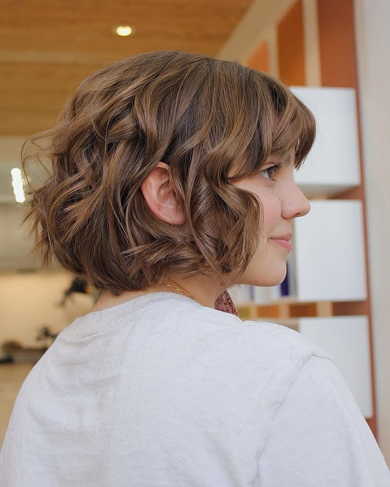 12. Wavy Textured Bob with Soft Fringe