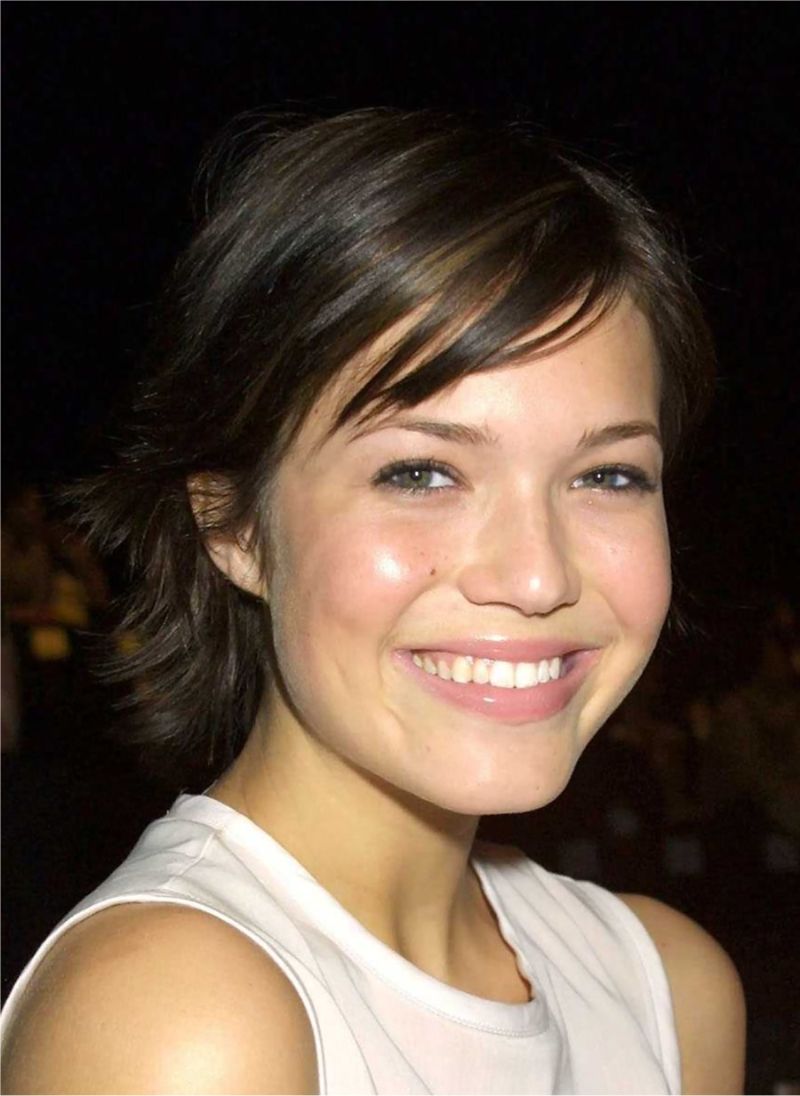 14. Wispy Layers with Side-Swept Bangs