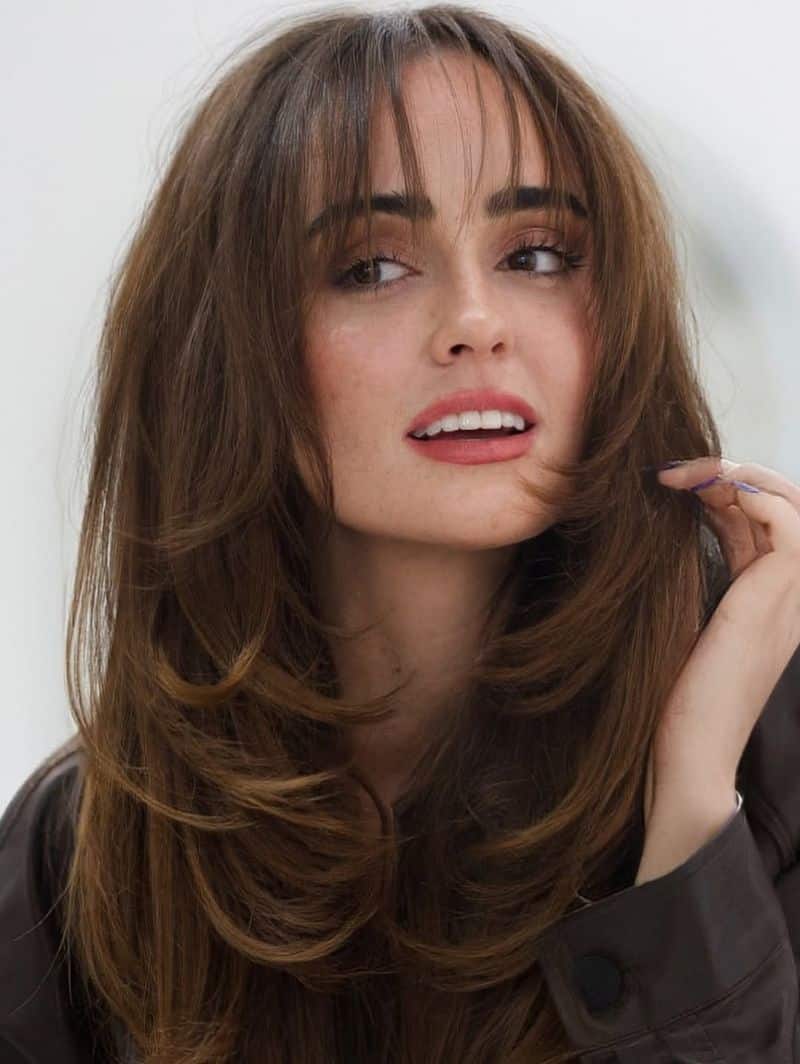 51. 70s Feathered Layers with Soft Fringe