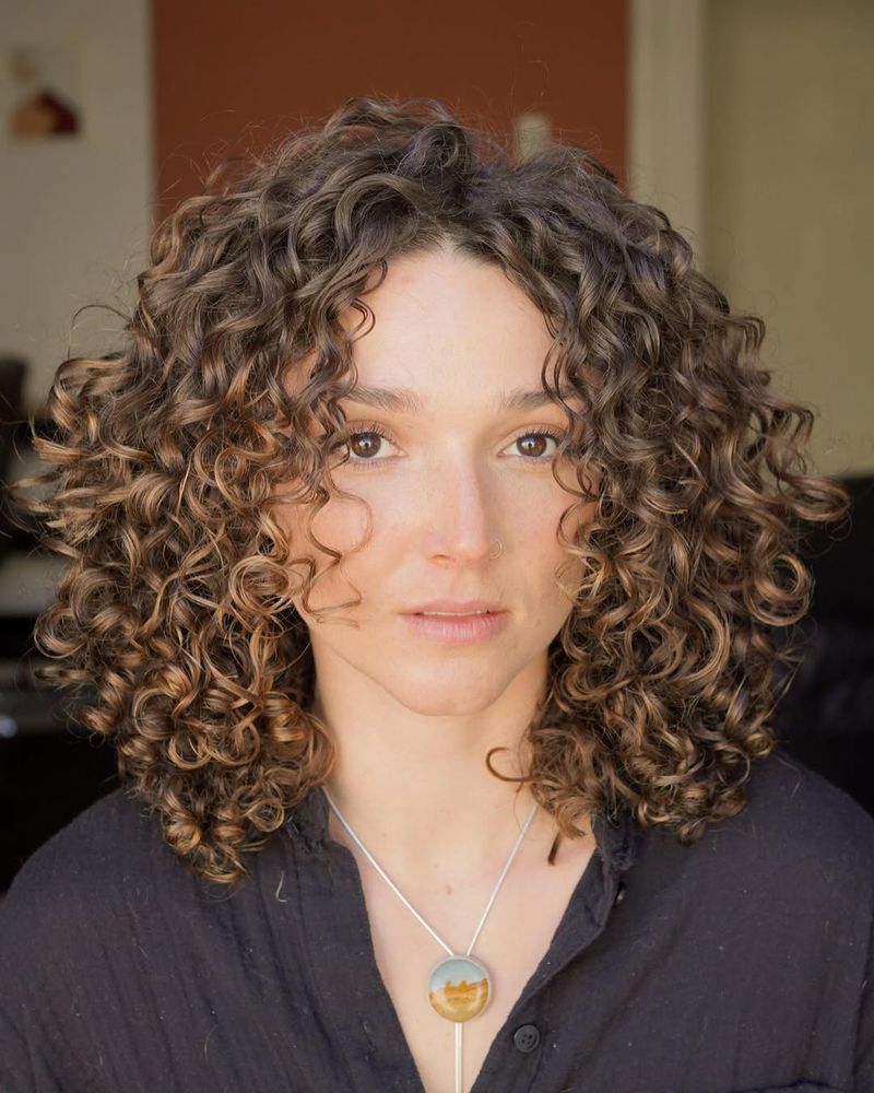 36. Amber-Kissed Ringlets and Rounded Layers