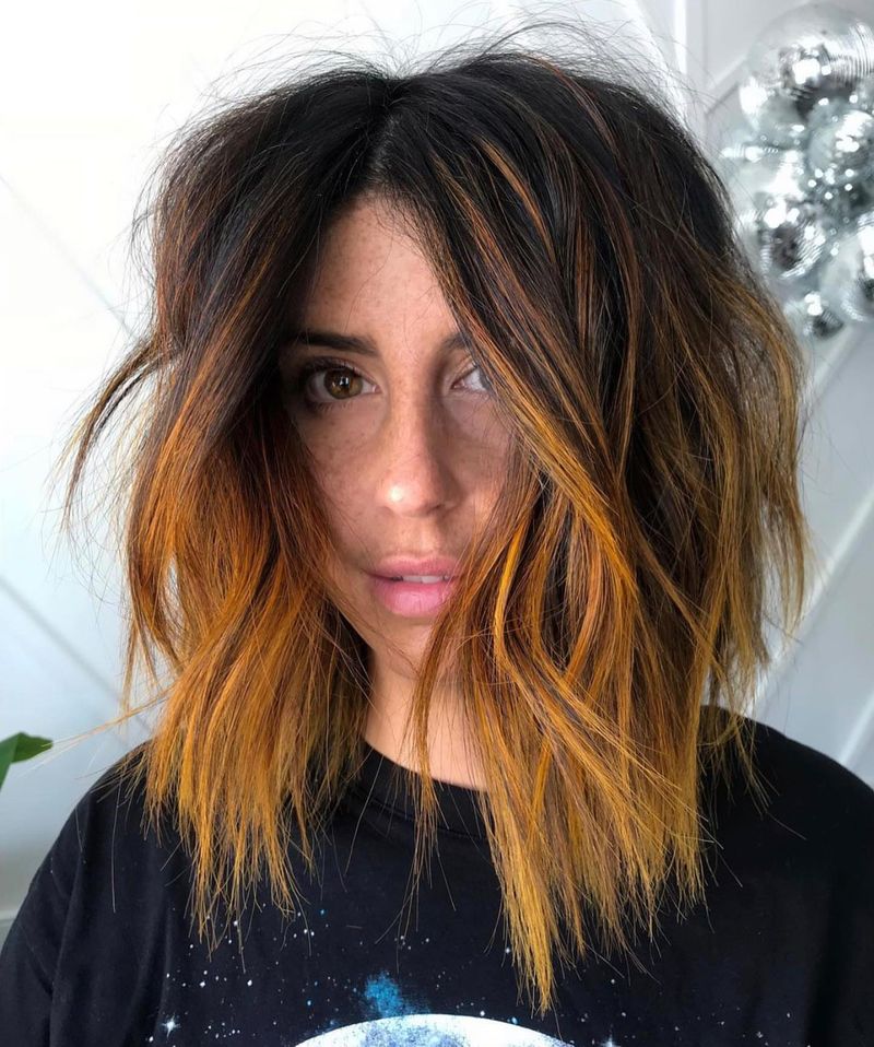 30. Amber-Tipped Messy Lob