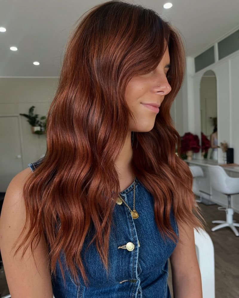 7. Amber Waves with Curtain Bangs