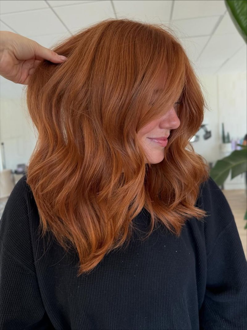 45. Amber Waves with Curtain Bangs