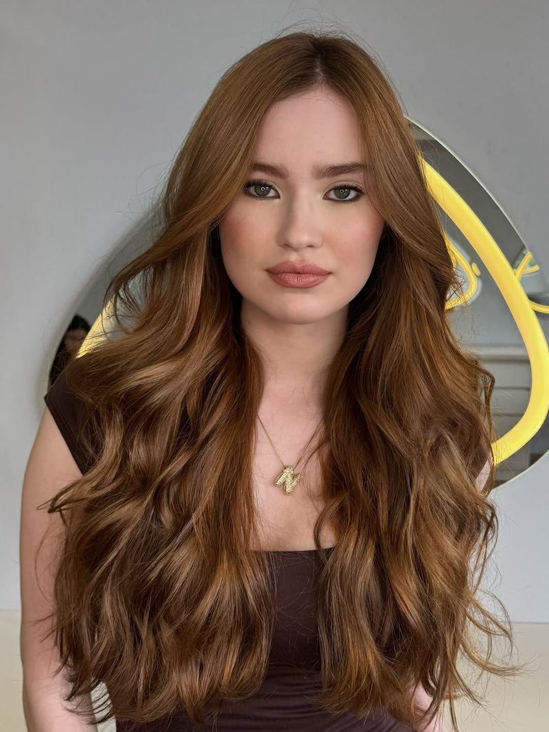 40. Amber Waves with Long Curtain Bangs