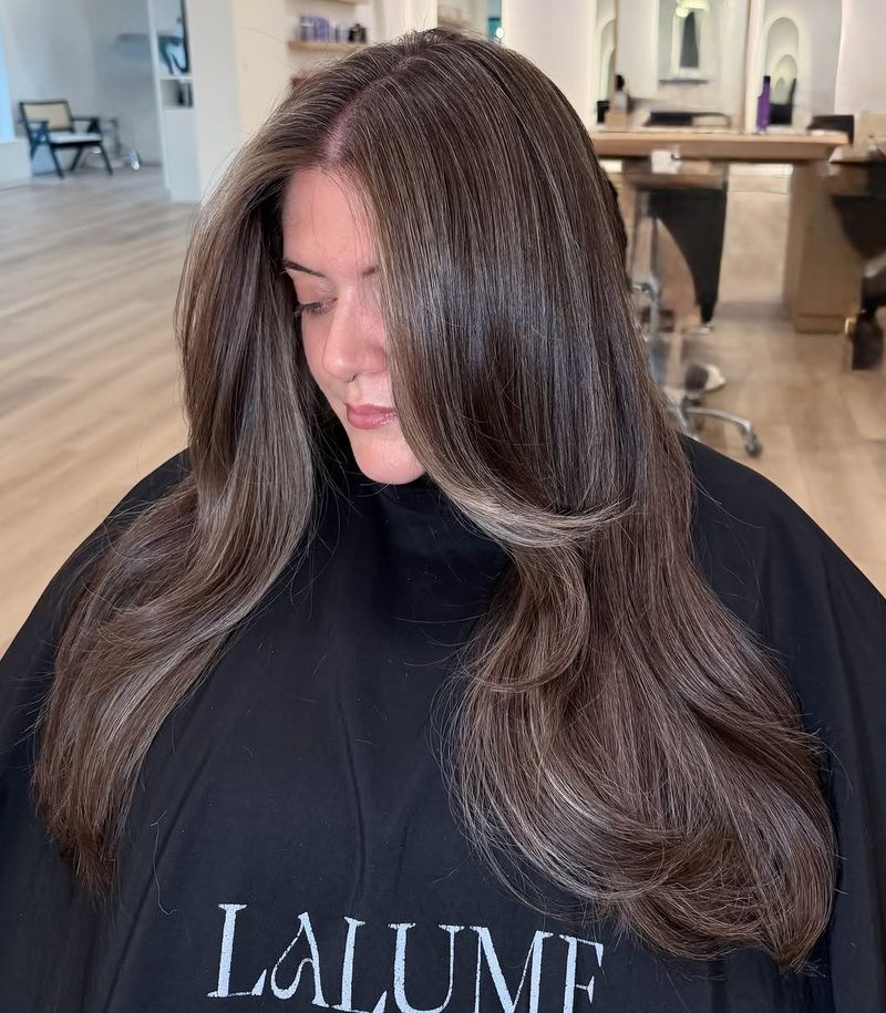 25. Ash Brown Blowout with Long Face-Framing Layers