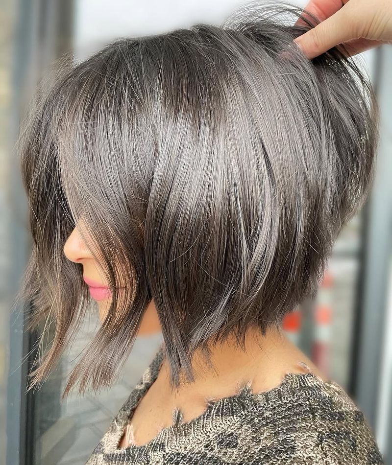 17. Asymmetrical Stacked Bob with Silver Highlights